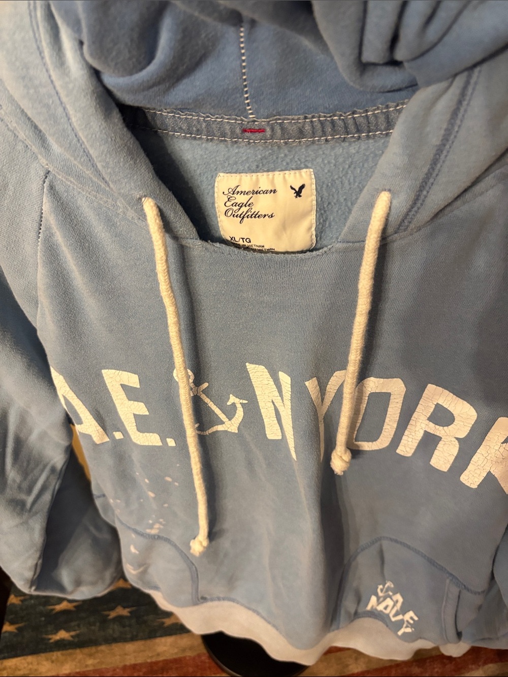 American Eagle Outfitters Light Blue Pullover Hoodie with White Drawstrings